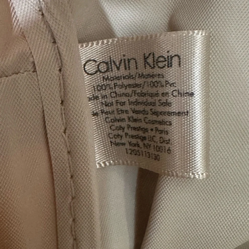 Calvin Klein Tan and Black Laptop Bag with Sturdy Fabric